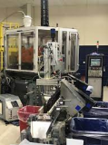 how does a blow molding machine work